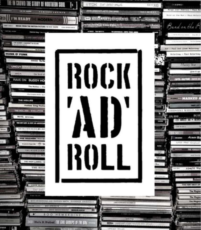 Grafika przedstawiająca logotyp projektu Rock 'ad' Roll. Duży biały kwadrat z czarnym napisem nazwy projektu.  